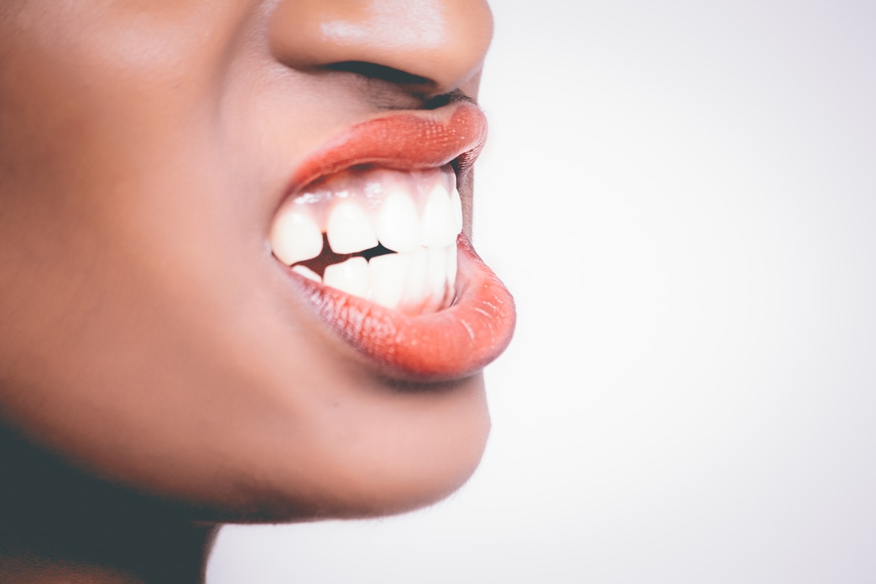 Girl baring her teeth