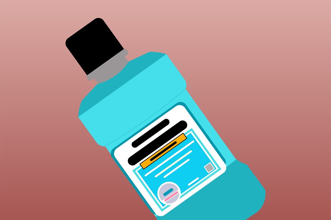 A cartoon picture of mouthwash displays its label.