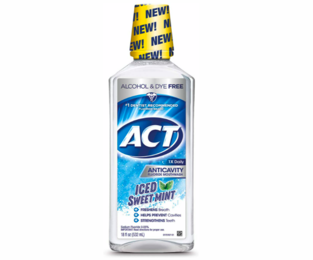 A bottle of ACT mouthwash which is alcohol and dye free.