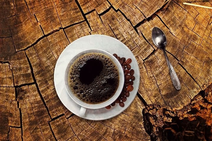 a cup of hot coffee, which could be contributing to teeth grinding