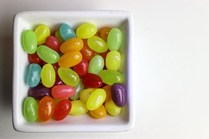 a bowl of jelly beans, the classic Easter treat that is colorful but sticky