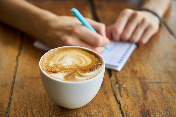 a hot cup of coffee, which may contribute to stains on the teeth