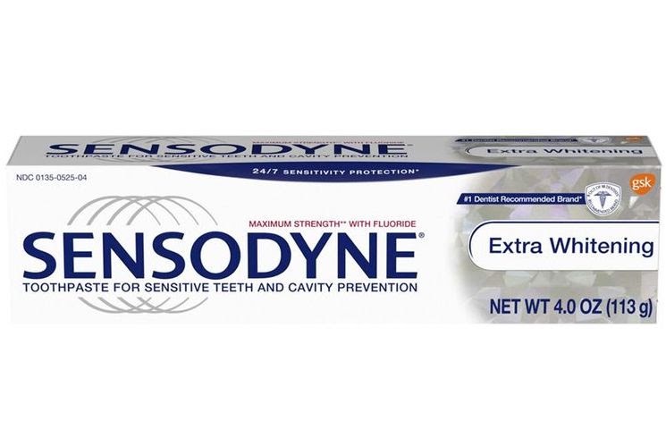 a tube of Sensodyne Extra Whitening Toothpaste