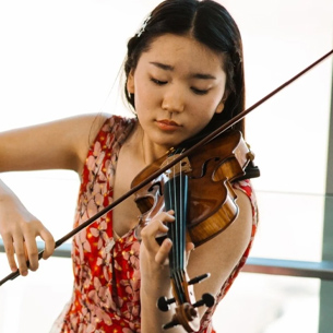 Keila playing violin