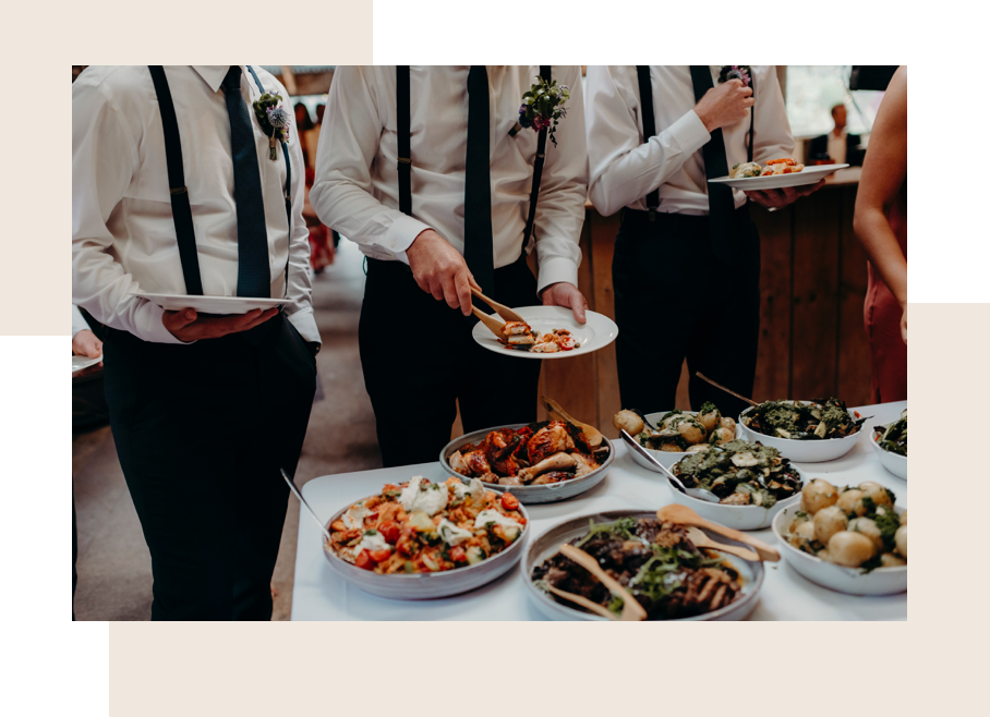 Groom serving meal at wedding