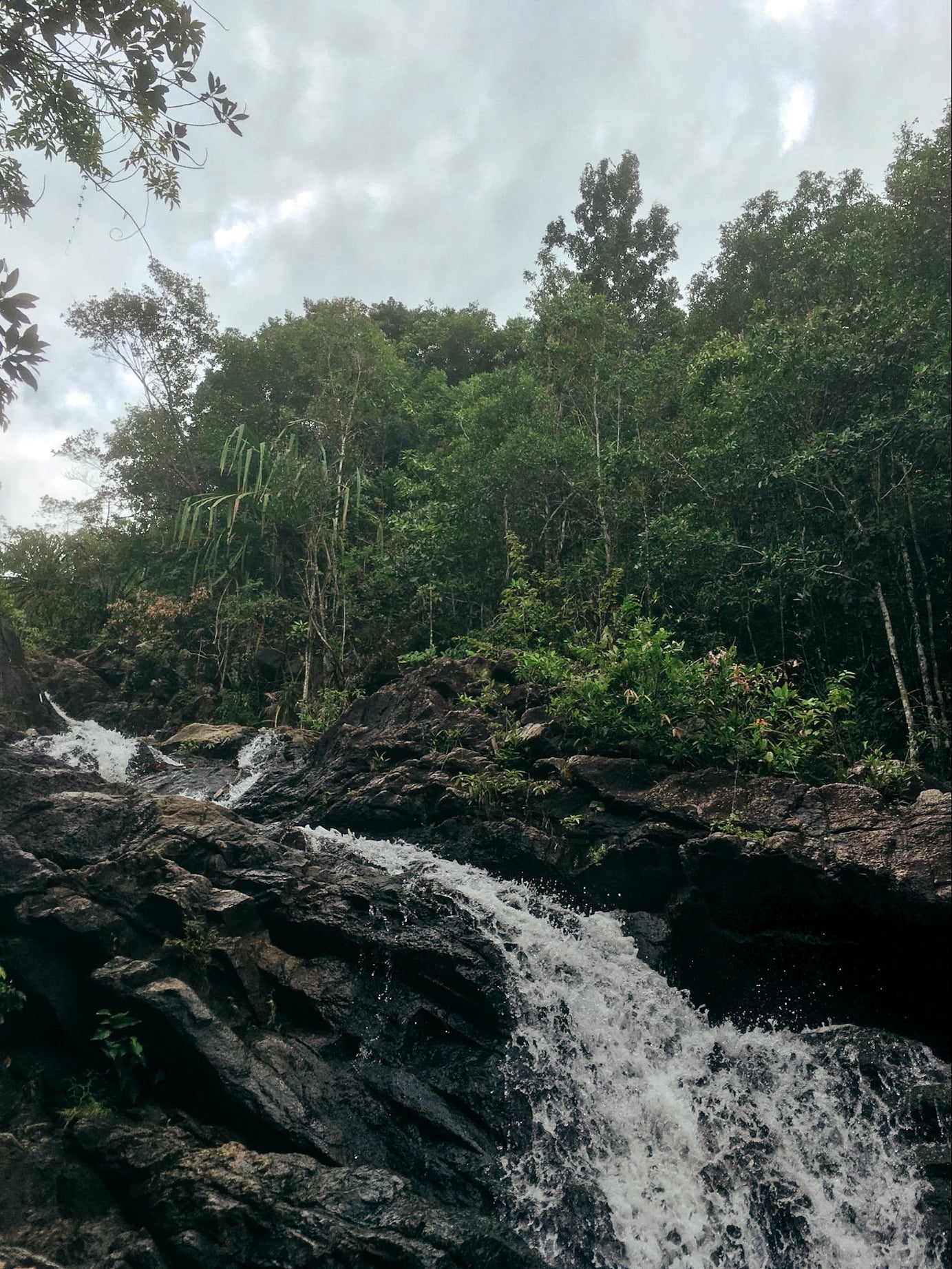 exploring a waterfall in koh phangan, thailand