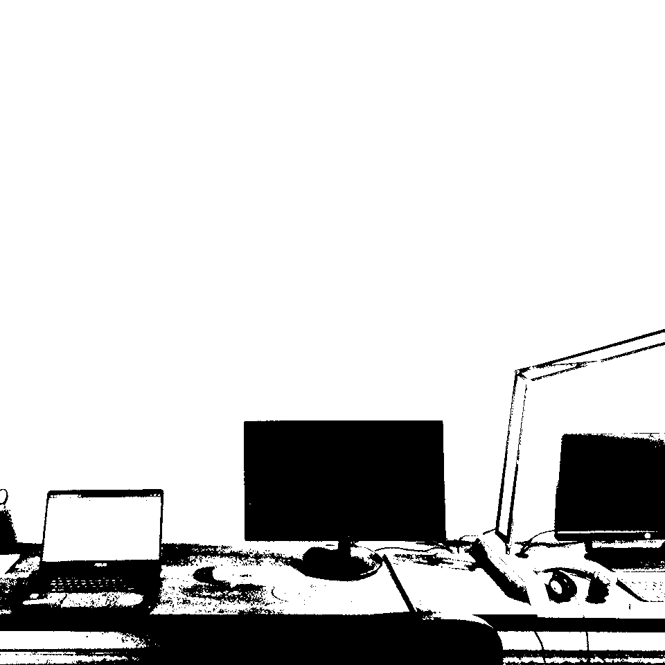 Small Potion - Computers over office desktop