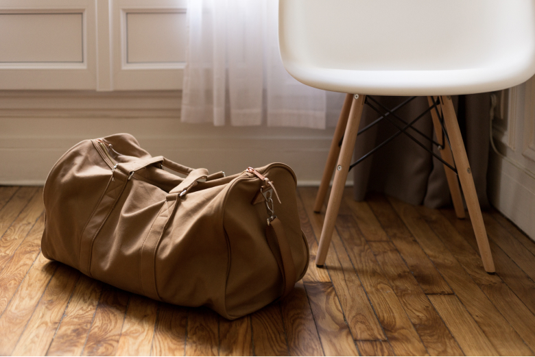 Bag on the floor by a chair