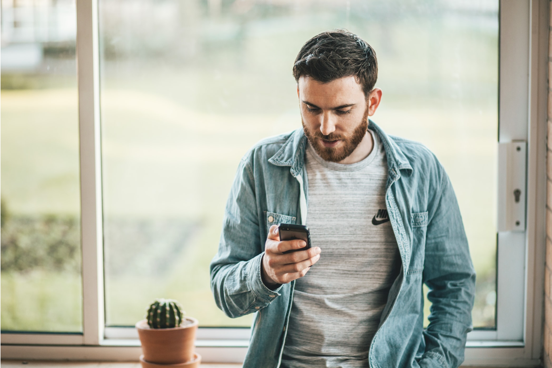Mobile UI Design - man using his mobile phone