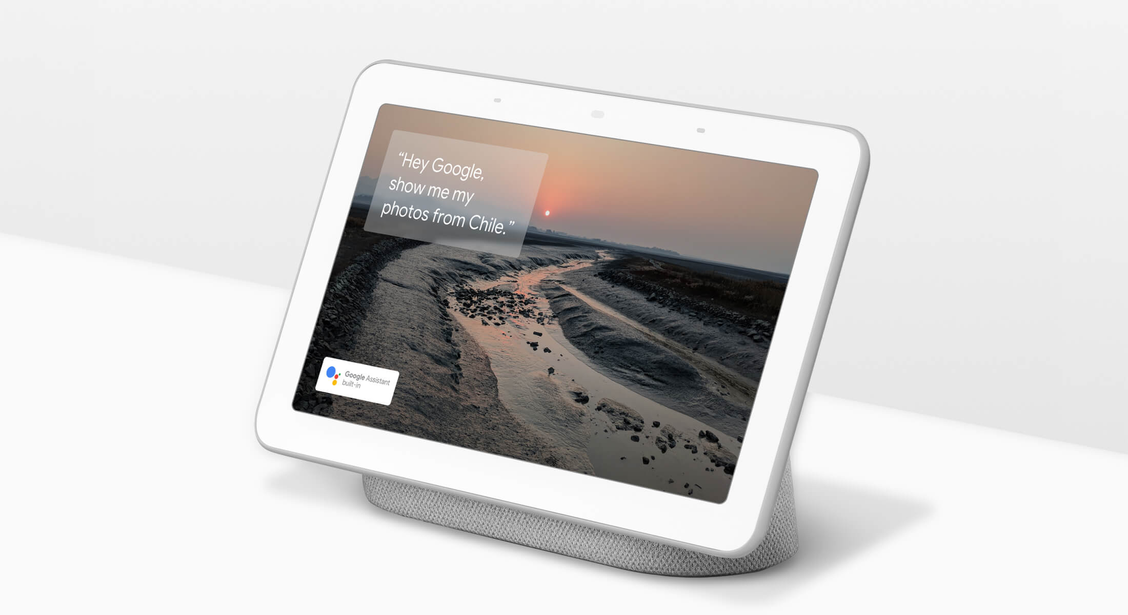 Google Home Hub with home screen image.