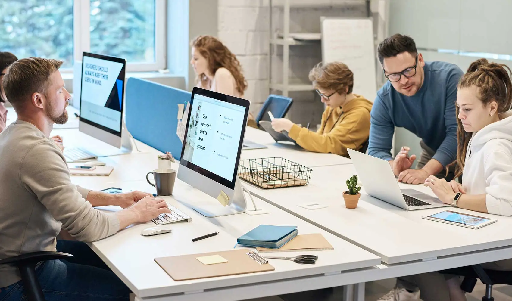 People working in front of the computer