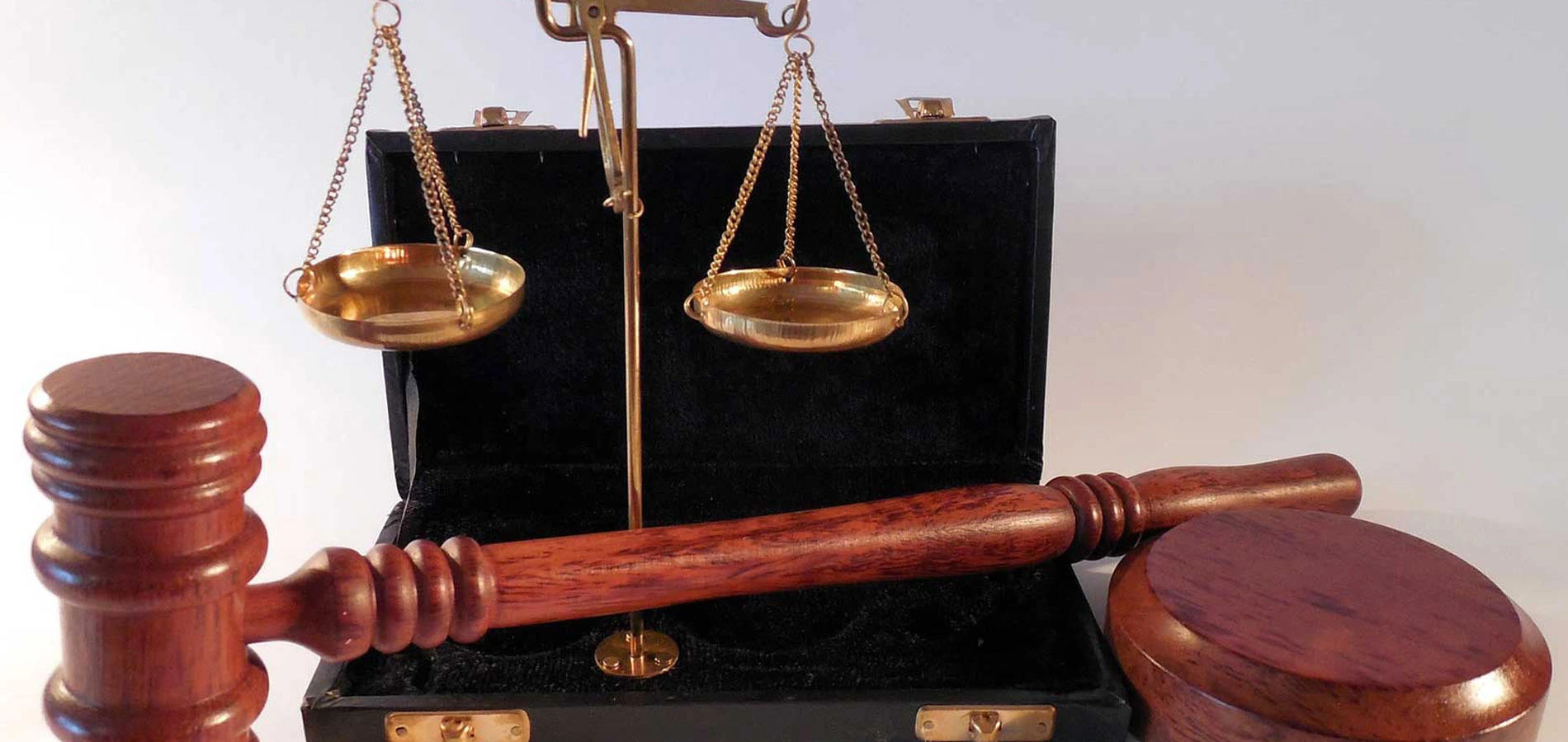 Scale of justice and a judge hammer