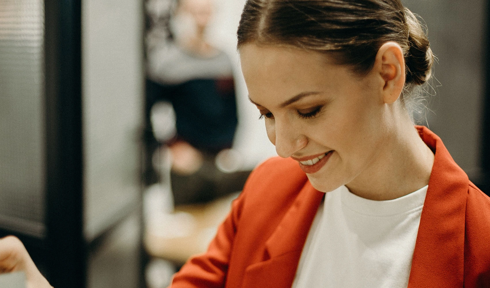 Woman wearing red blazer