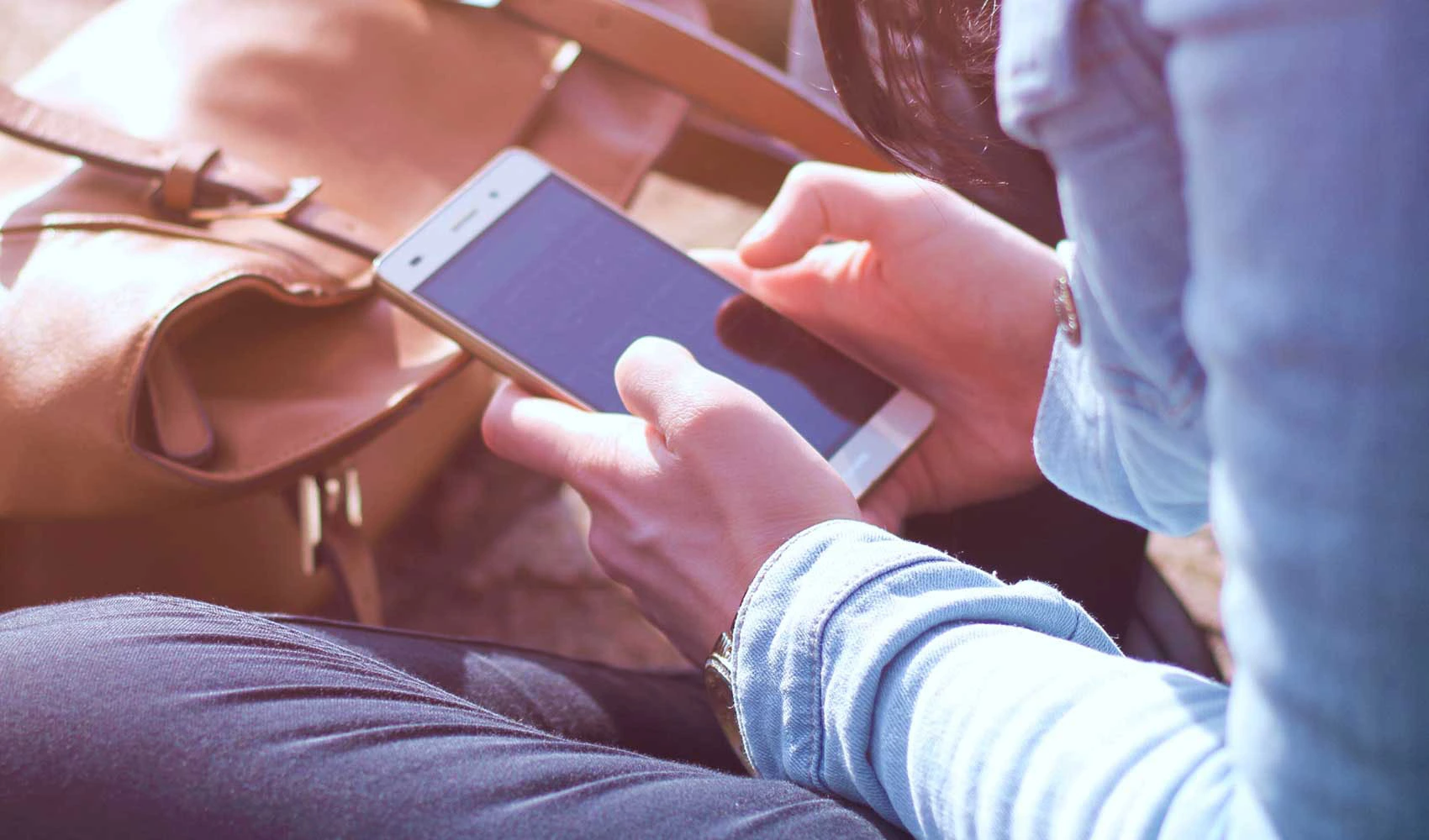 Woman using her mobile phone