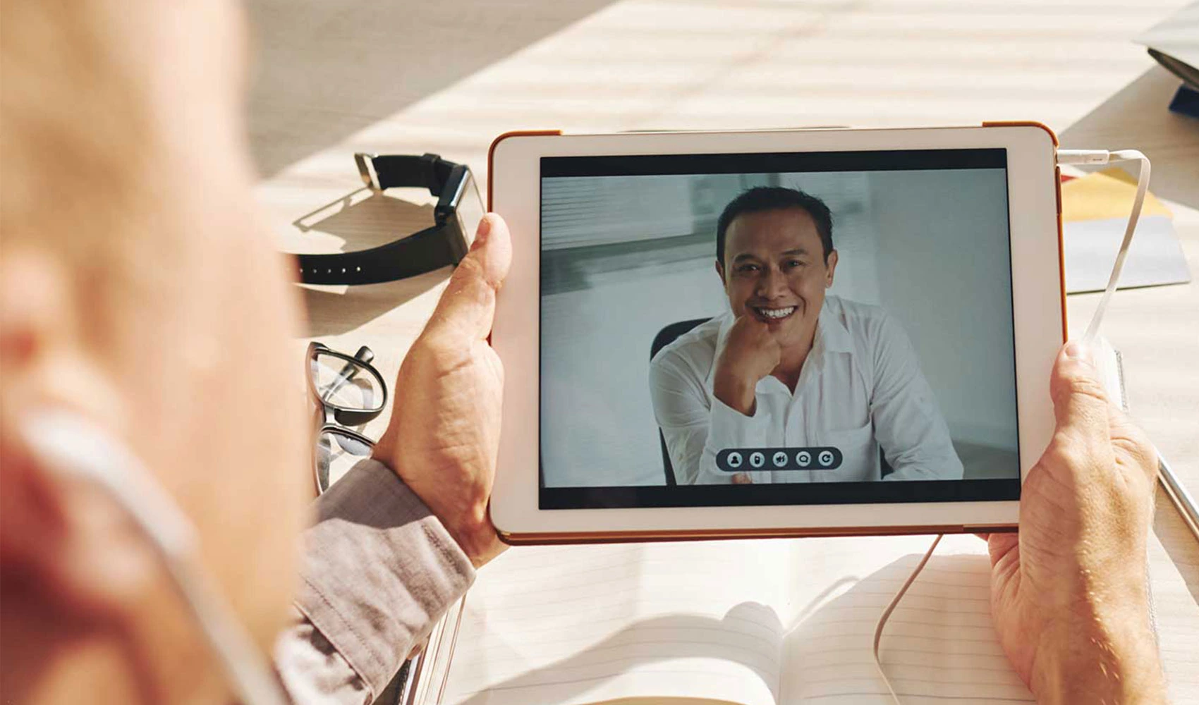 Two home-based workers doing video chat