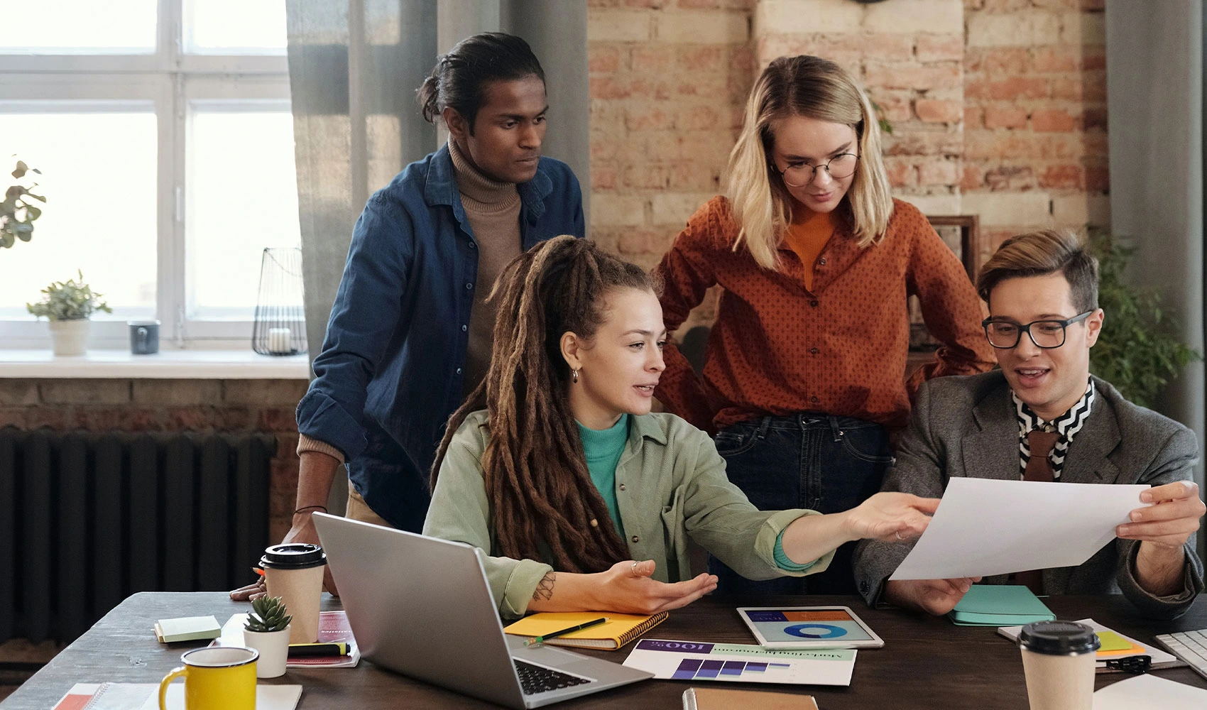 A group of people discussing marketing plans