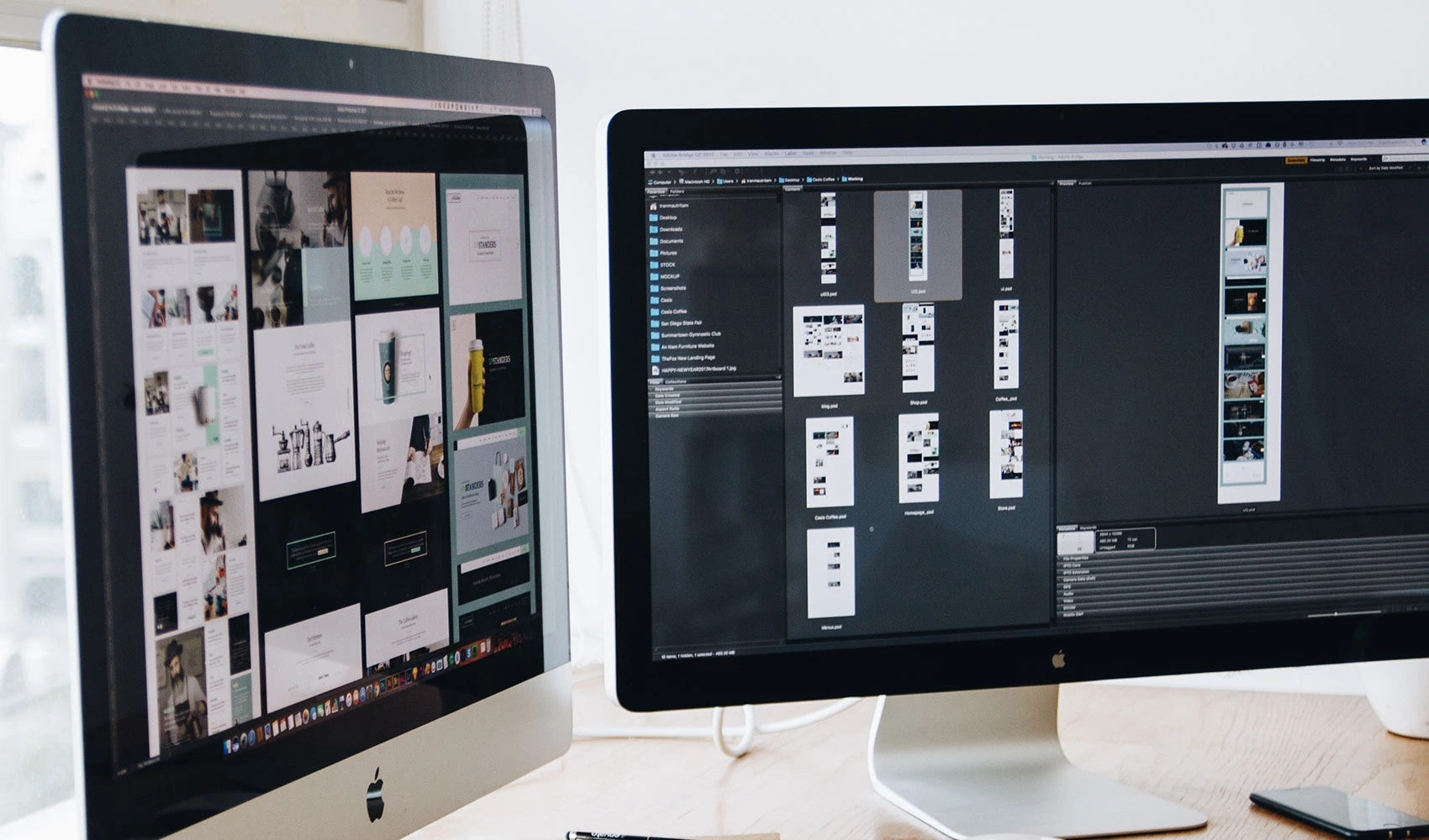 Silver iMac on top of brown wooden table