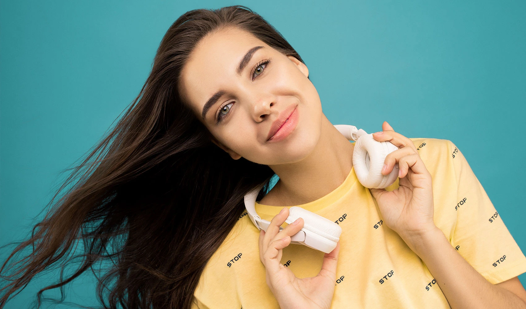 Photo of woman wearing headphones