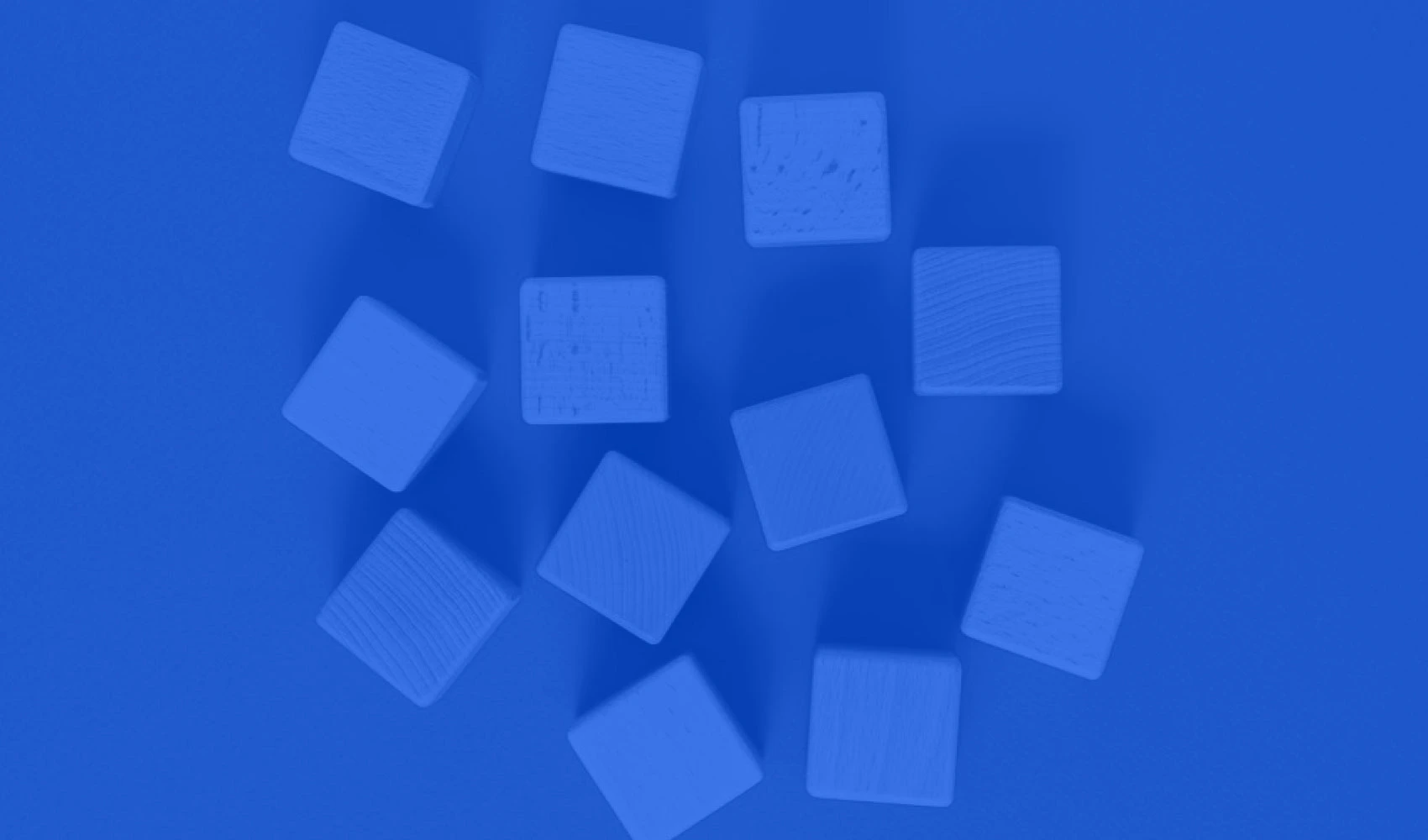 Aerial view of wooden blocks with blue overlay