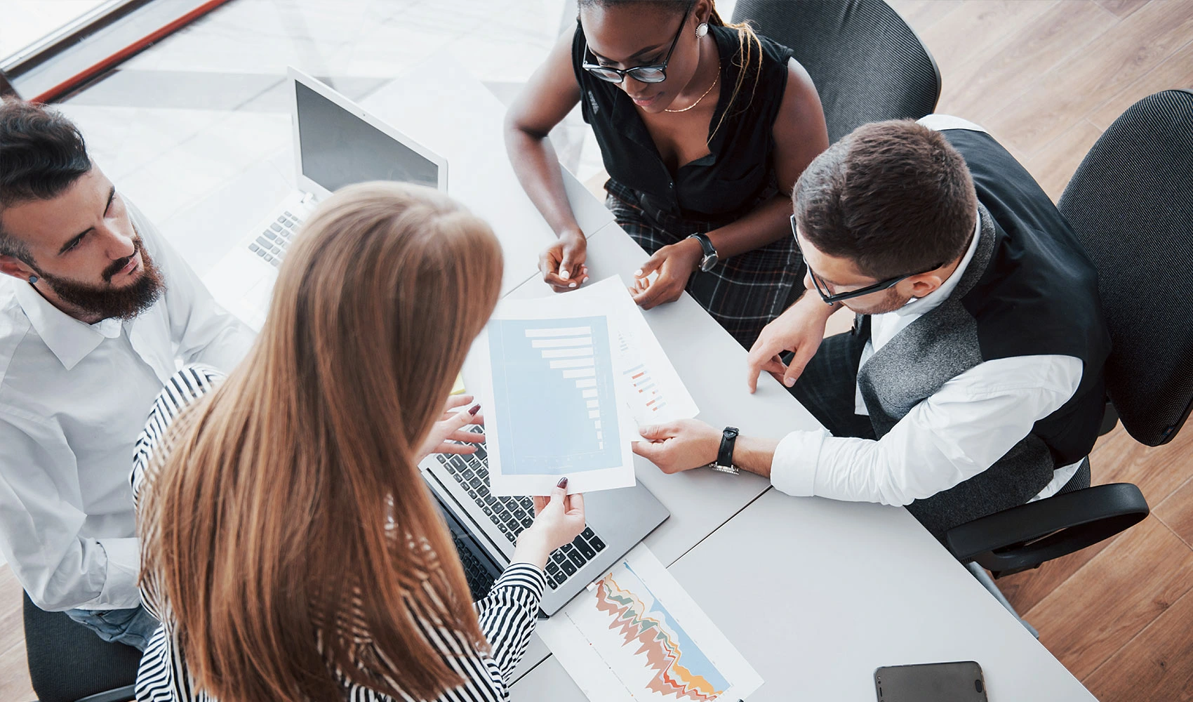 Employees brainstorming in their team meeting