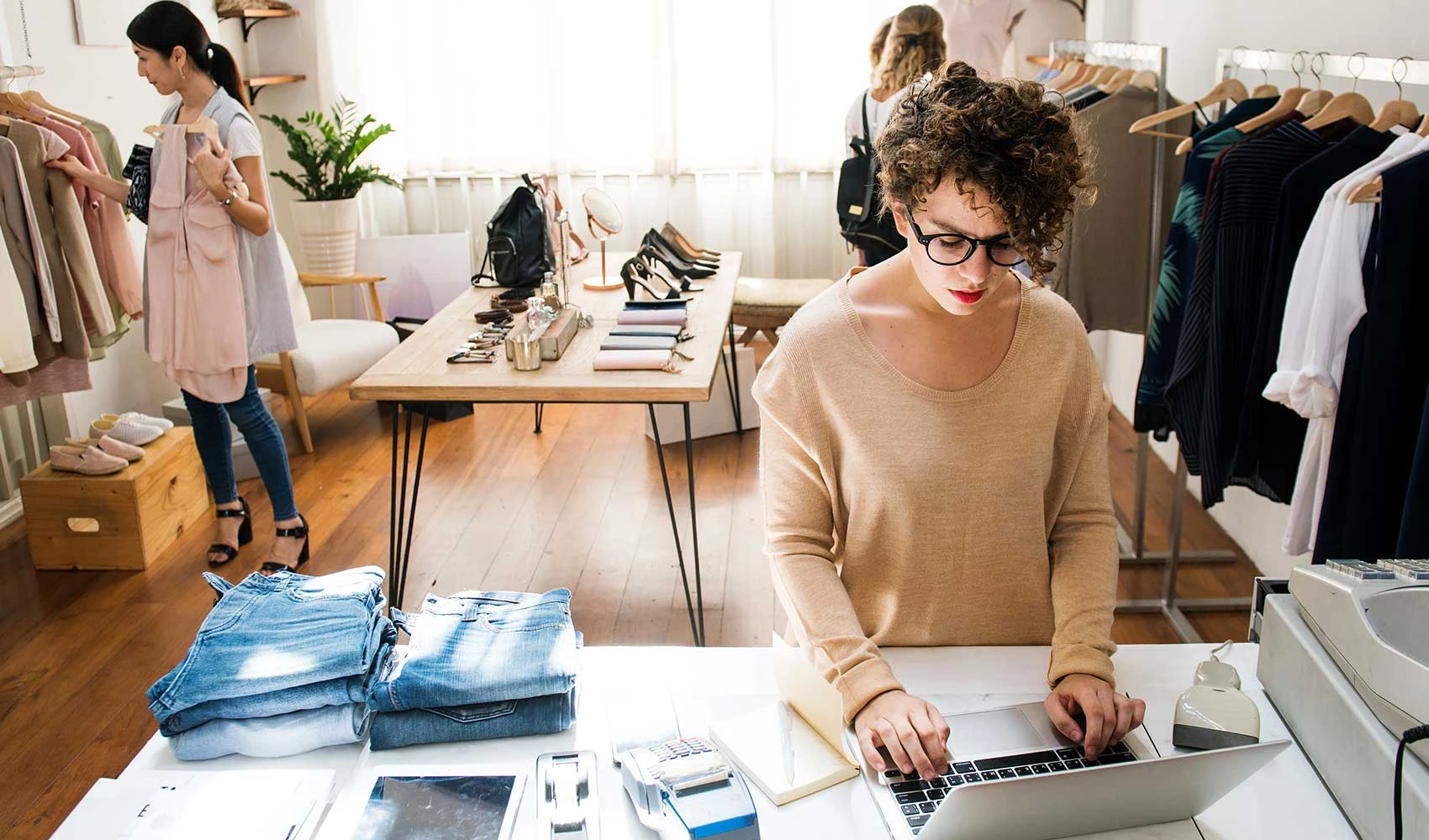 Female business owner using laptop
