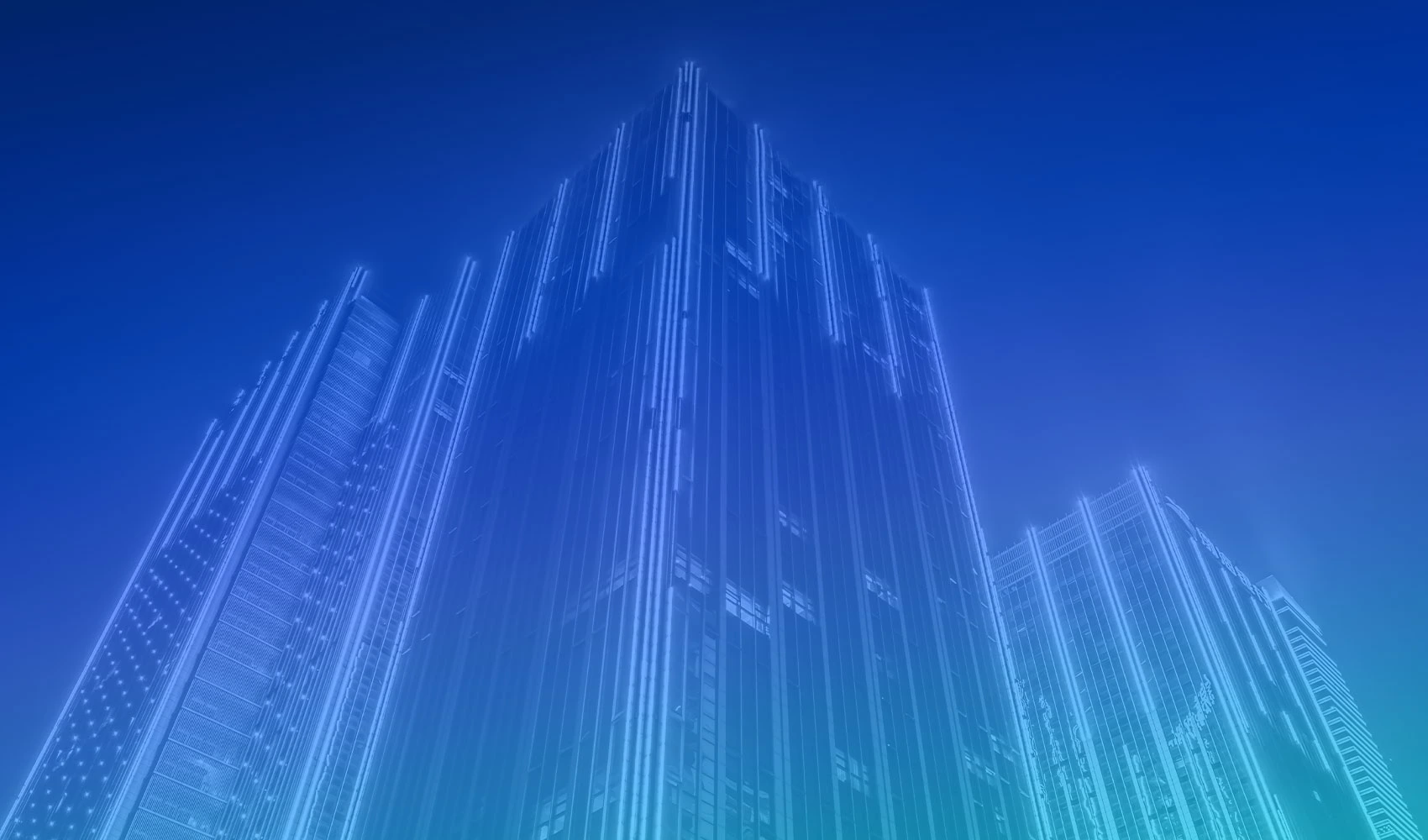 Illuminated buildings at night with blue gradient overlay