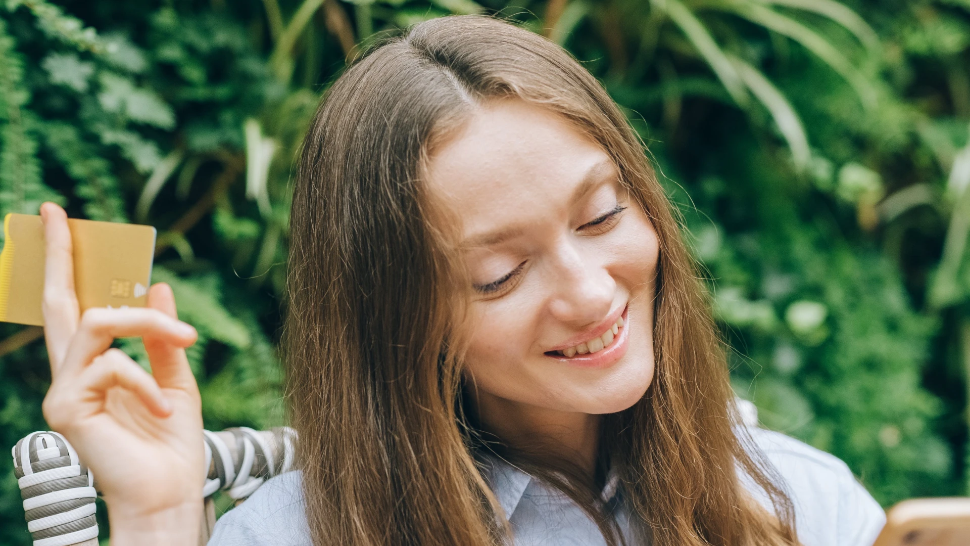 Almond nuts on white bowl with blue gradient background