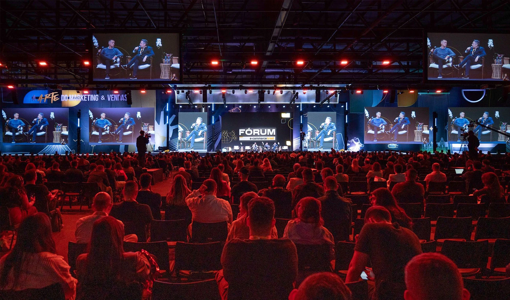 Forum hall with large crowd