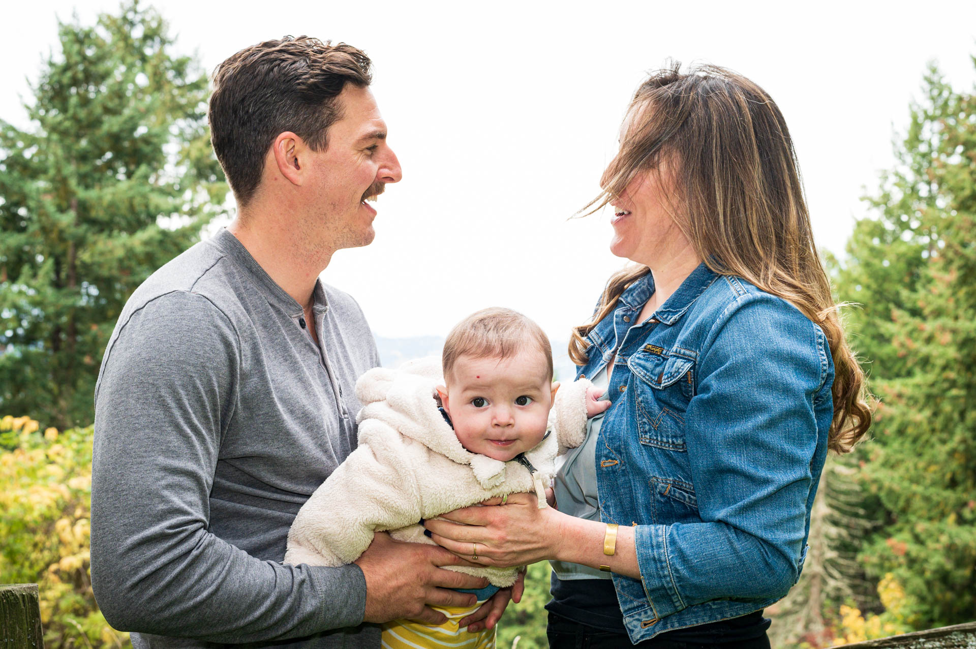 outdoor family portrait with newborn in tow