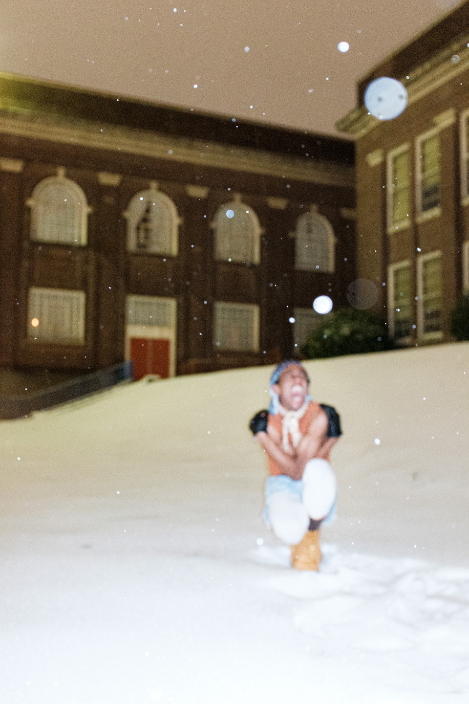 outdoor portrait during a snowstorm of a fashion model screaming