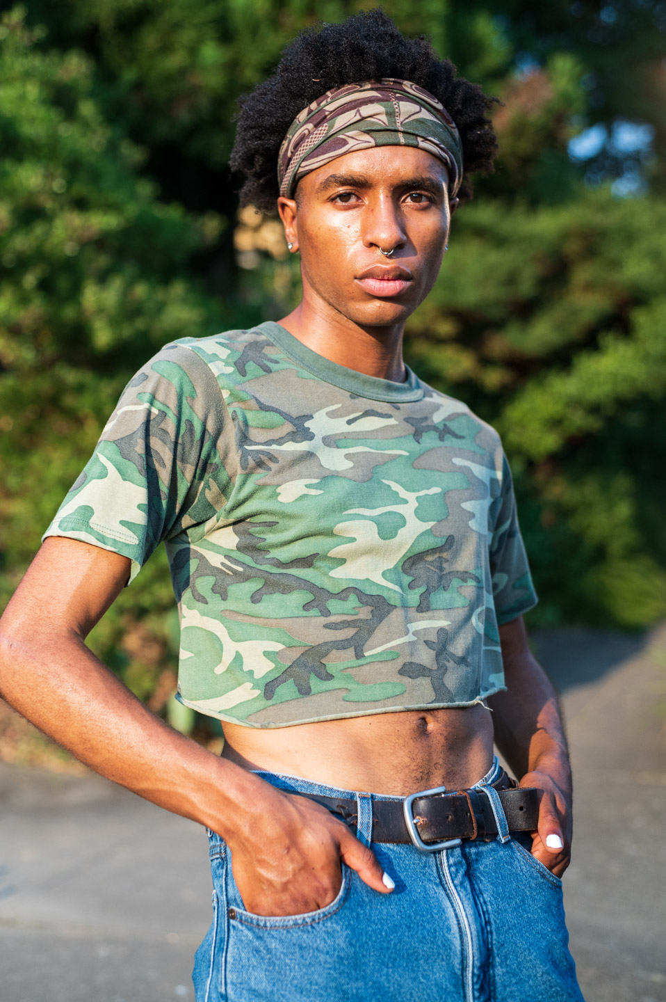model poses in the sunlight outdoors during a lifestyle fashion shoot