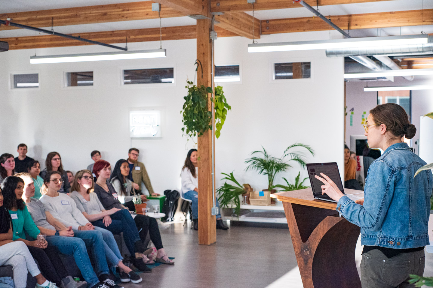 a speaker at a nonprofit event hosted at the office of a local technology coporation