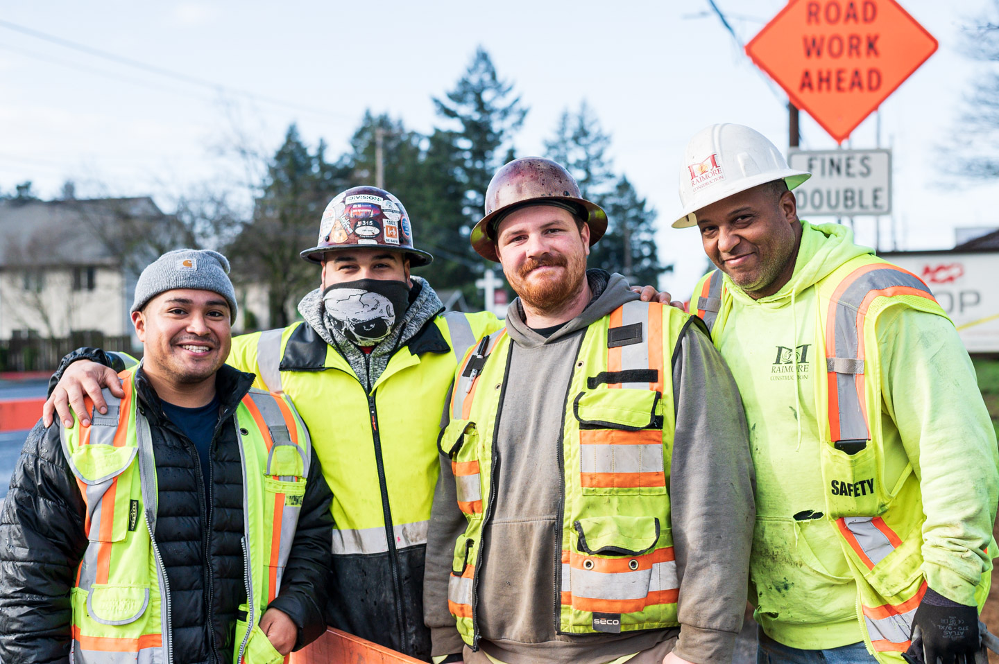 editorial photo of construction workers commissioned by the city