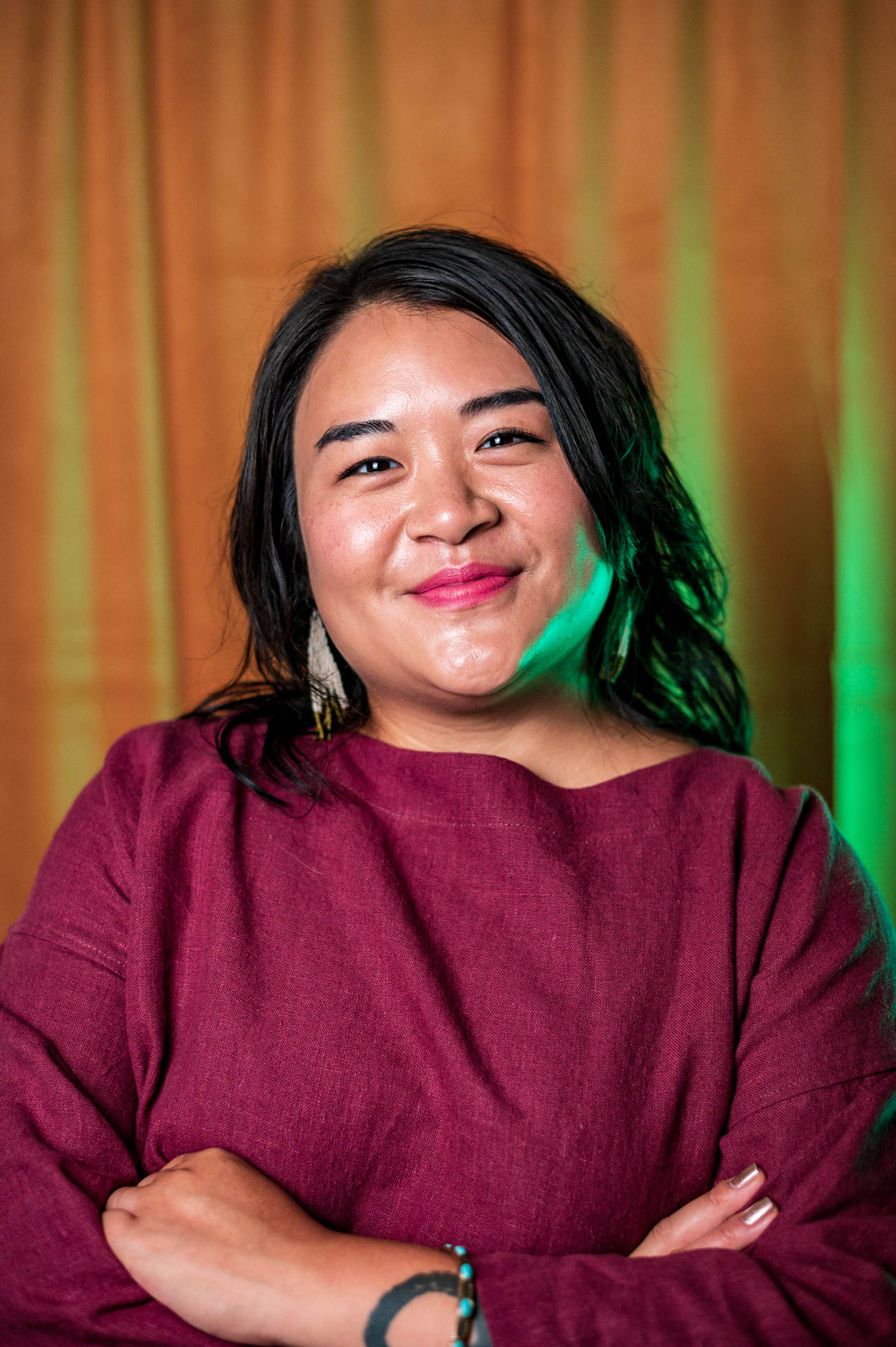 young design professional poses for a headshot