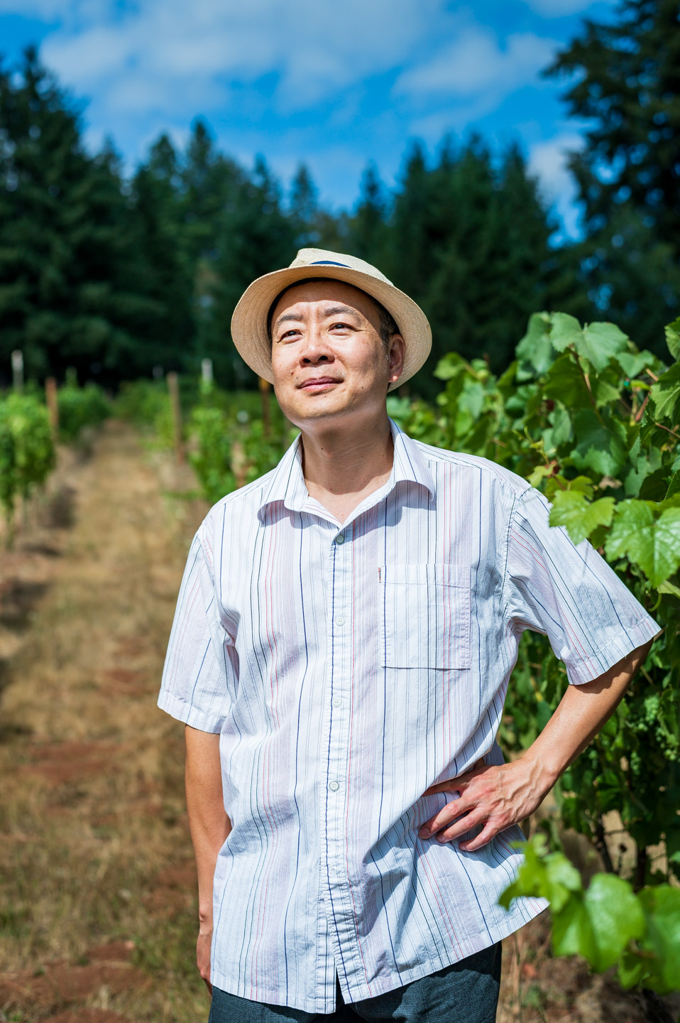 entrepreneur posing in a vineyard