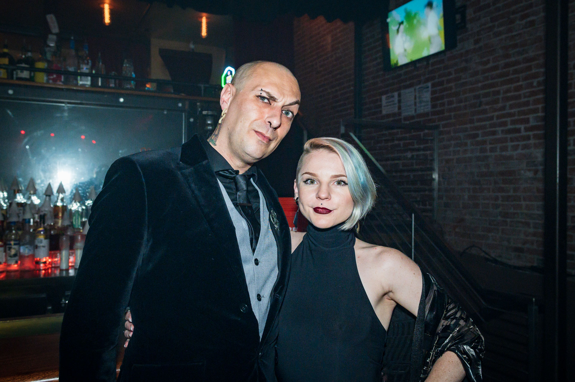 cute couple dressed in black at a party