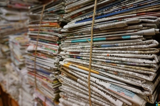Stacks of newspapers are tied up with string and serve as great content inspiration