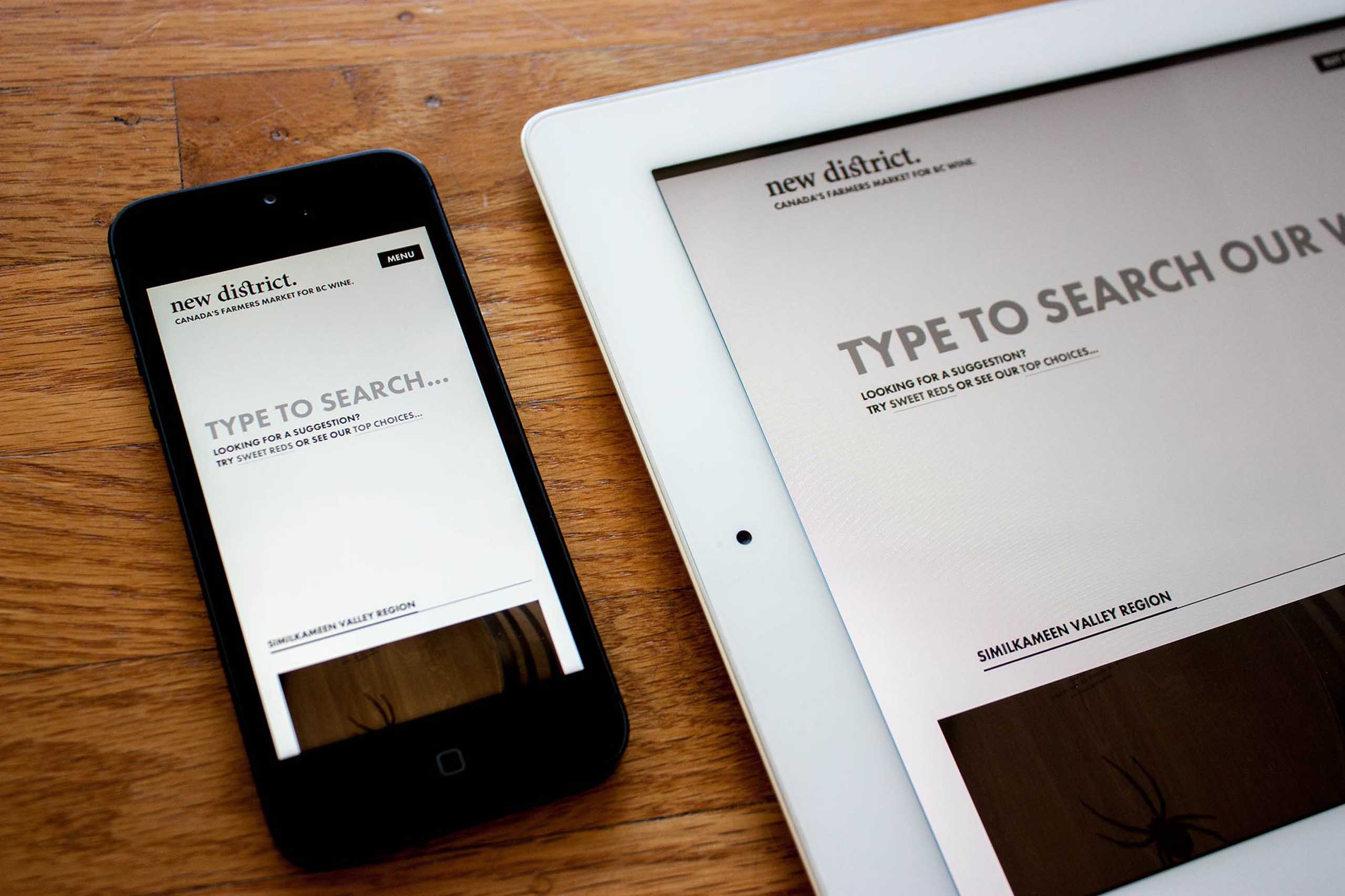New District E-Commerce website homepage, showing prominent search focused page on mobile and table devices — by Yagnyuk.