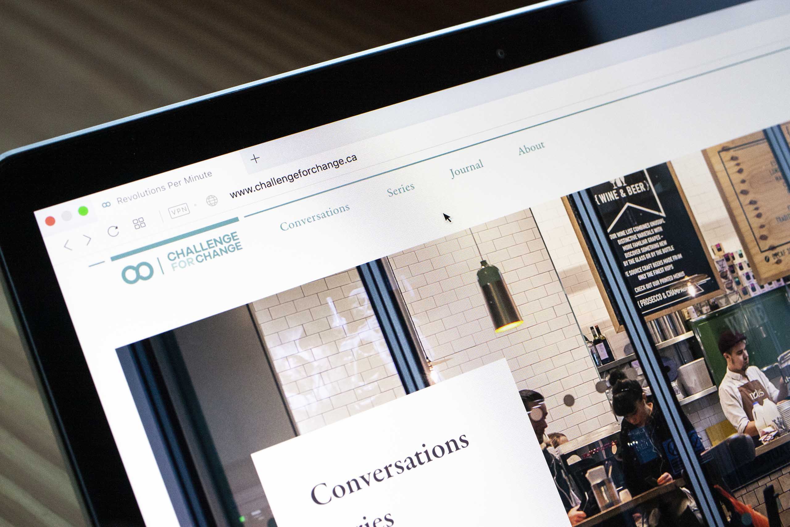 Close up photo of the home page on a laptop screen showing the menu and typography — by Yagnyuk.