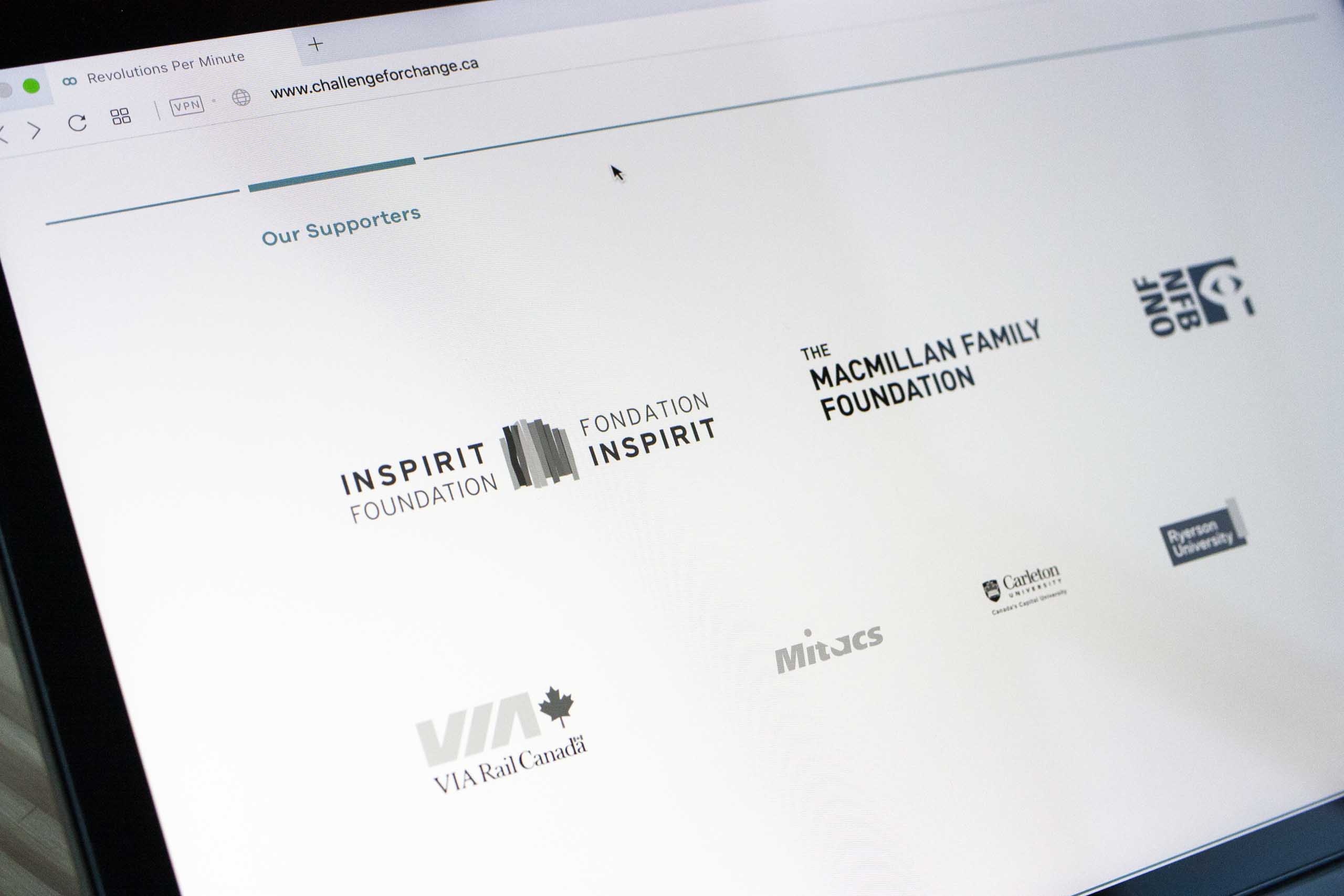 Photo of the supporter section with various logos of Challenge for Change sponsors — by Yagnyuk.