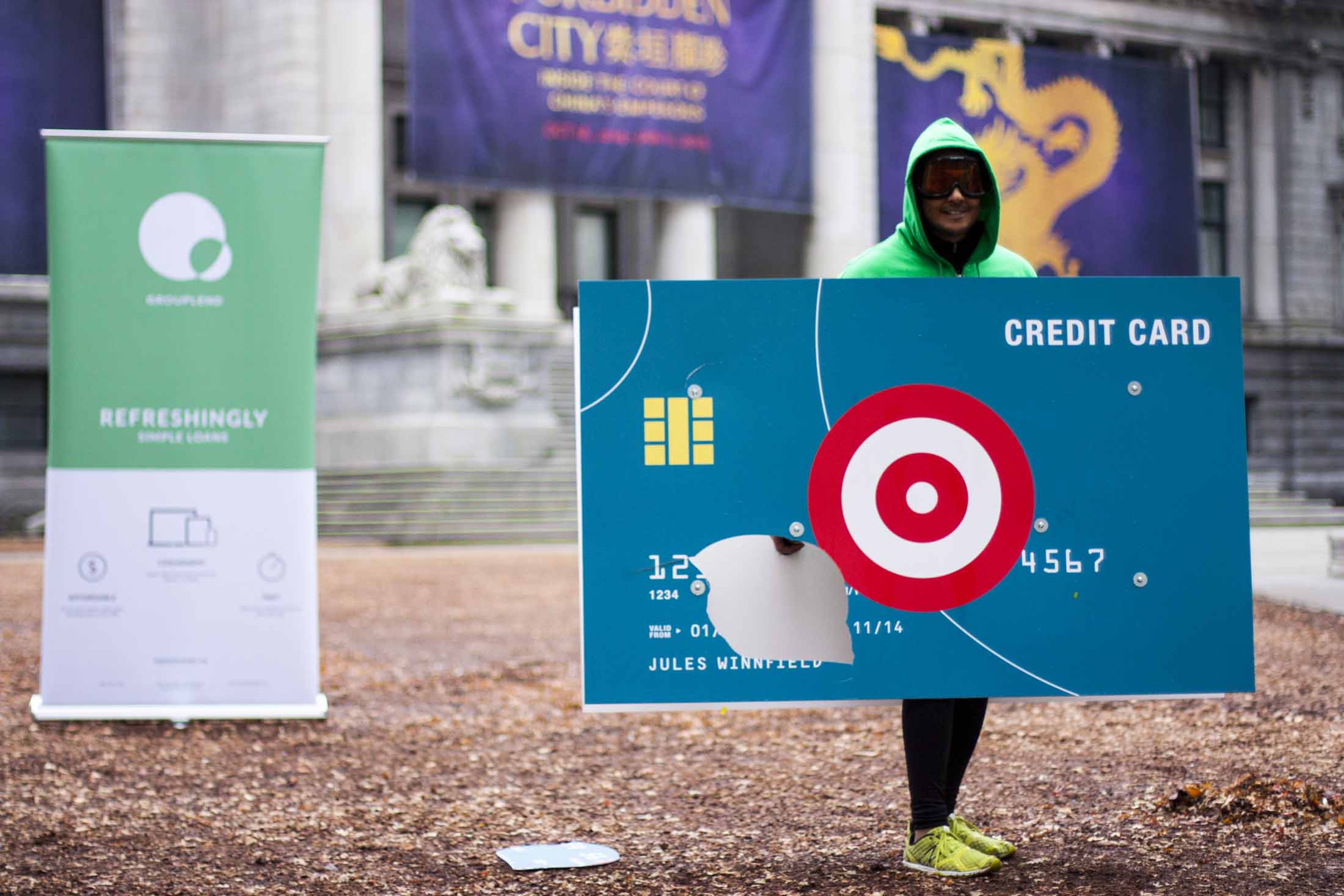 Credit card costume showing some dent from the continuous water balloon impacts — by Yagnyuk.