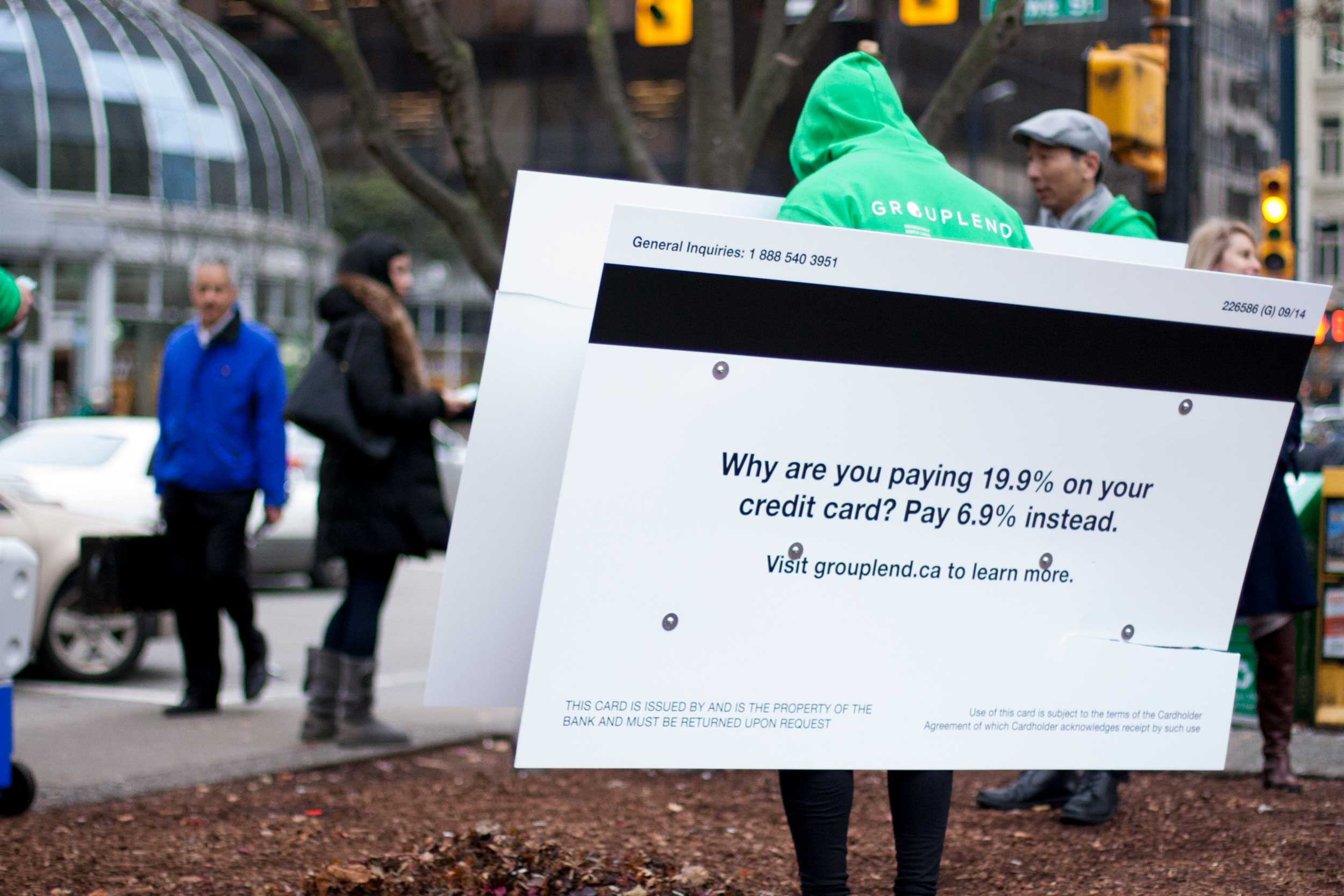 The back of the credit card costume showing advertising copy about interest rates — by Yagnyuk.