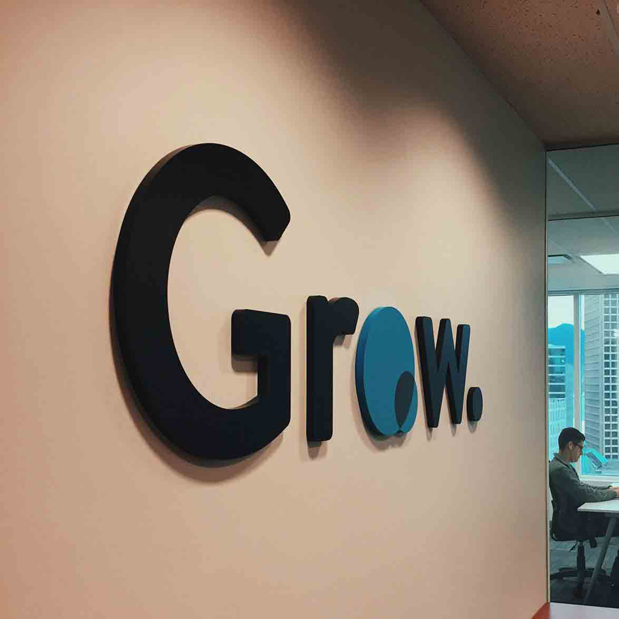 Grow Technologies office logo installed as a physical sign at their Vancouver headquarters — by Yagnyuk.