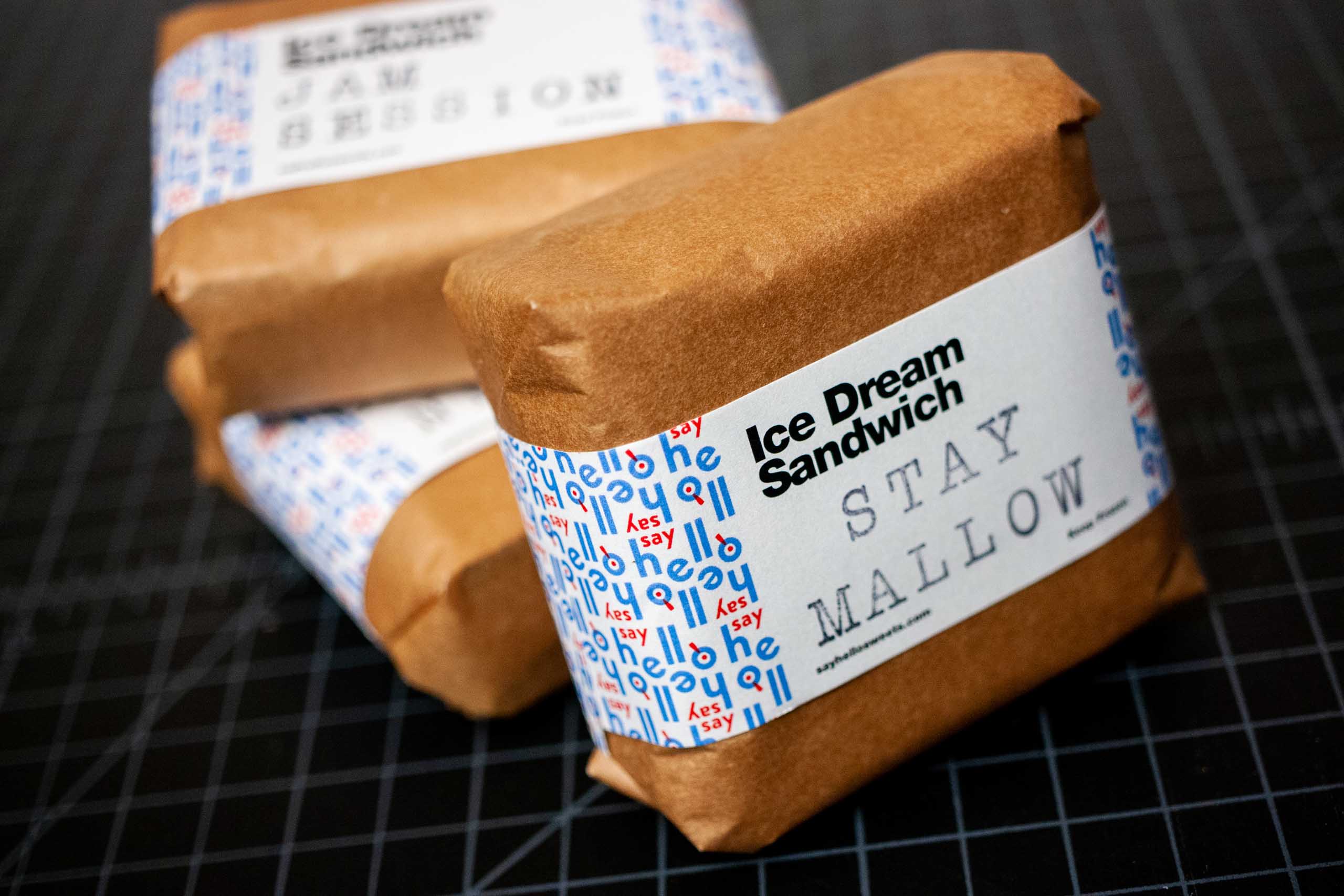 Tree ice cream sandwiches with label on, showcasing the warm brown craft paper wrapper — by Dima Yagnyuk.