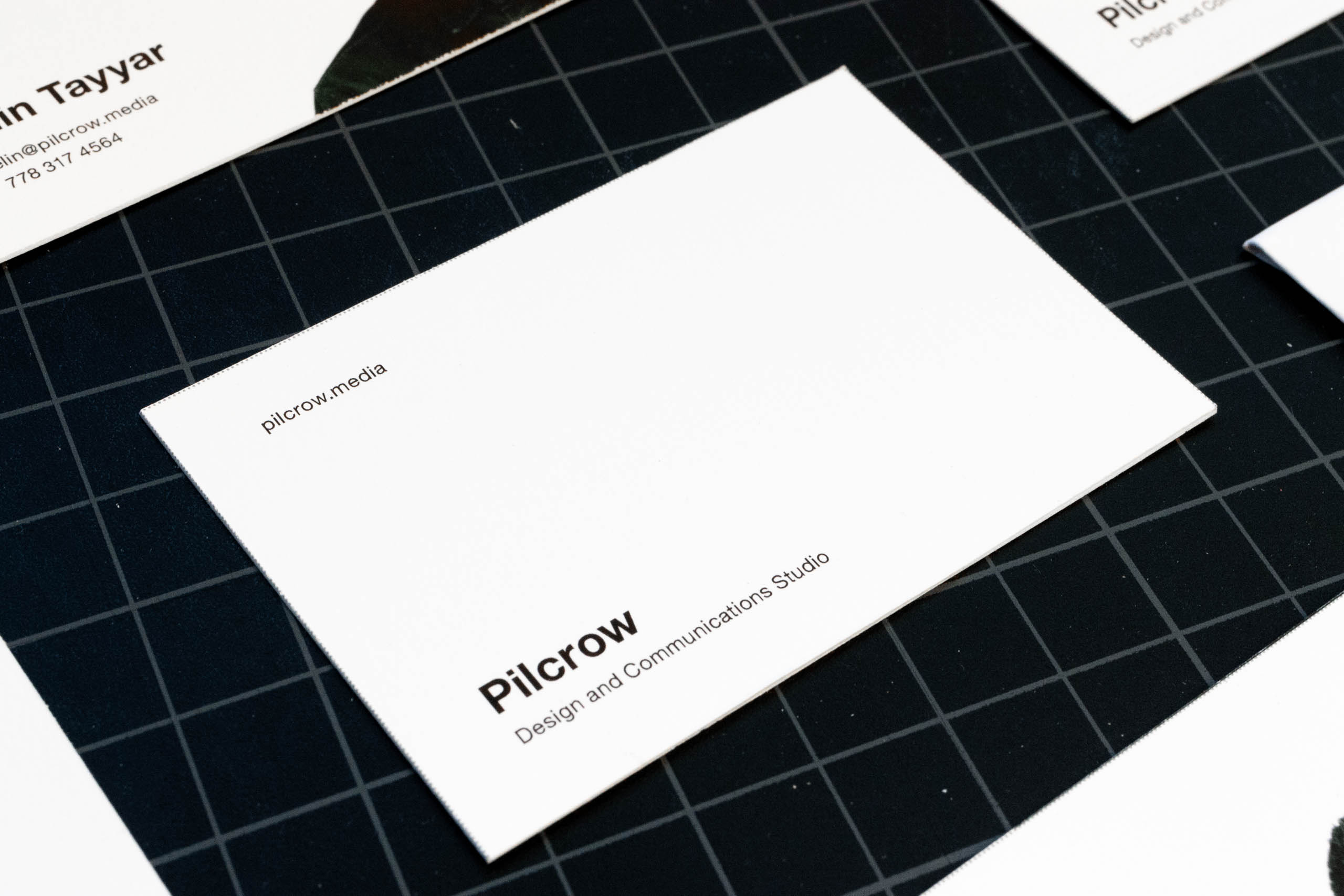 Shared side of the Pilcrow Media business cards, outlining studio website and tagline — by Yagnyuk.