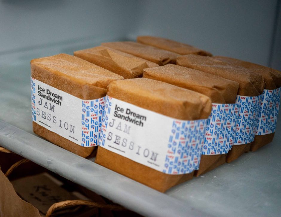 Say Hello Sweets Sandwich Wrapper System showcasing brand pattern — by Dima Yagnyuk.