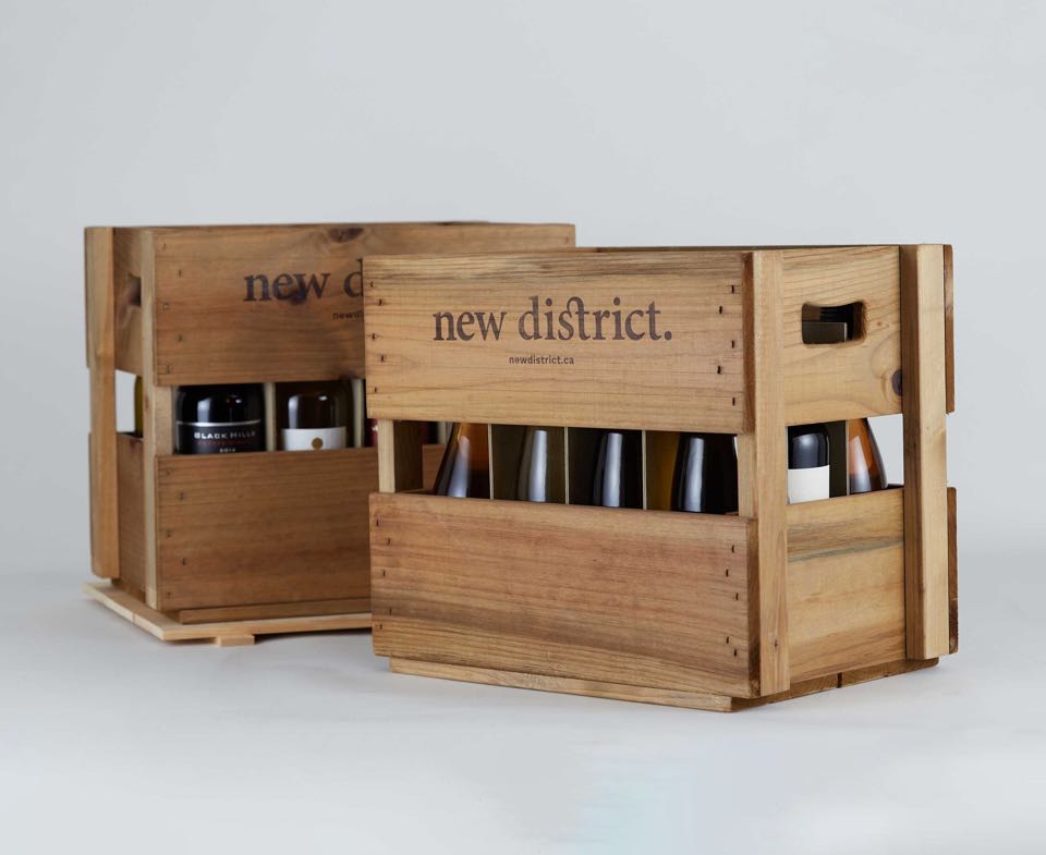 New District Custom wooden wine crates with logo burned in — by Dima Yagnyuk.
