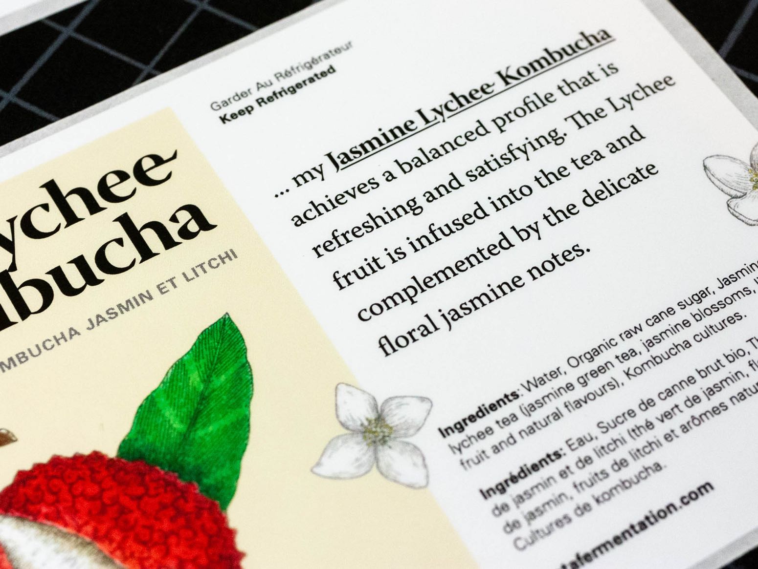 Close up details of custom product description embedded into label for Jasmine Lychee Kombucha — by Yagnyuk.