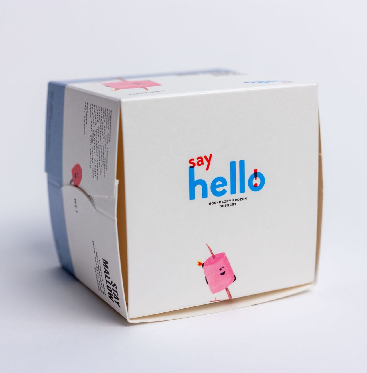 Say Hello Sweets close up of the top enclosure of the custom structural, foodsafe, direct injection ice cream cube featuring a vibrant illustration of a marshmallow character — by Dima Yagnyuk.
