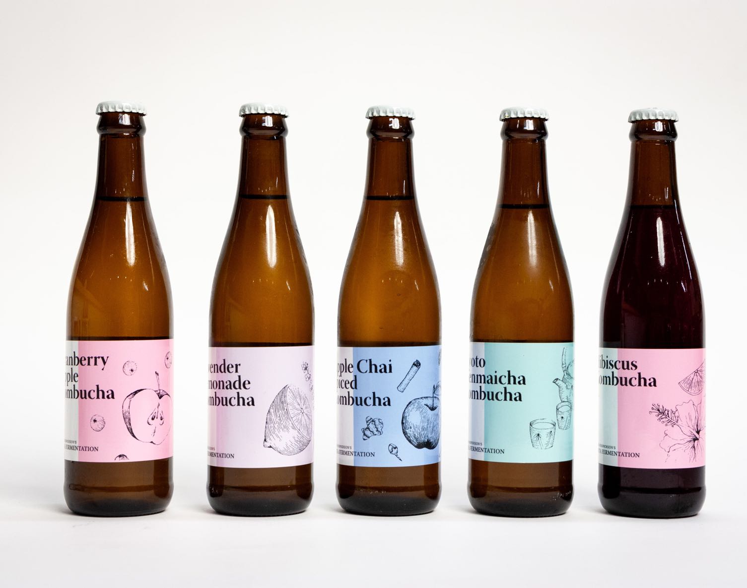 Biota Seasonal Set of kombucha 330ml bottles with apple, lemon, genmaicha tea, lavender, cranberry and hibiscus illustrations by Jessica Fraser — by Yagnyuk.